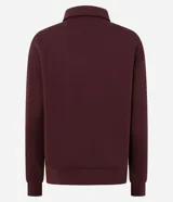 Saco cerrado de algodón con felpa, color bordó, con cuello polo, cierre frontal con botones, manga larga y puños y bajo ajustados.