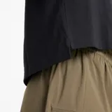 Remera corta negra de algodón con logo de New Balance bordado en el pecho.