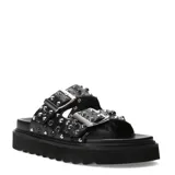 Sandalias negras de plataforma con dos tiras anchas con hebillas y tachas plateadas.