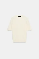 Jersey de punto de lana con cuello redondo y manga corta, de diseño minimalista y corte recto.
