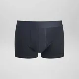 Pack de tres bóxers negros lisos con cintura elástica.