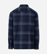 Camisa de manga larga con diseño de cuadros en tonos marrones, confeccionada en algodón. Presenta cuello camisero, cierre frontal con botones y un bolsillo en el pecho con botón.