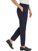 Pantalón de corte cónico Tommy Hilfiger, modelo 1985 Collection, color azul marino. Confeccionado en mezcla de algodón orgánico, con cintura elástica, cierre de botones y bolsillos traseros de ojal.