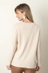 Buzo color verde azulado de tejido de punto fino con frente acanalado y bolsillo con botón de strass.