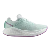 Championes Salomon modelo Aero Glide 3, color verde menta con suela blanca y detalles en violeta. Cuenta con amortiguación de espuma de alta altura y diseño sin costuras en la parte superior.