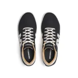 Championes Merrell modelo Cygnet Canvas para hombre, de lona negra con una gran "M" blanca en el lateral, suela de goma blanca y cordones blancos.