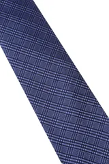 Corbata verde oscuro con estampado floral y pañuelo de bolsillo a juego.