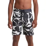 Boardshort de baño Volcom con estampado floral en blanco y negro, confeccionado en tejido técnico con cintura elástica y cordón de ajuste.