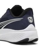 Championes de running Puma modelo Pounce Lite, color azul marino con detalles en blanco y negro. Presentan una parte superior de malla transpirable y una entresuela blanca de amortiguación.