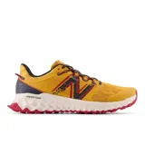 Championes de trail running New Balance Garoé MTGAROLY para hombre, color amarillo con detalles en azul y rojo. Cuentan con entresuela Fresh Foam, empeine de material sintético y suela AT Tread.