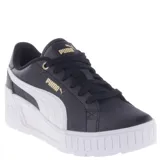 Championes Puma Karmen Wedge negros con plataforma blanca, detalles dorados y cordones negros.