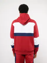 Canguro con capucha de Umbro del Club Nacional de Football, con diseño de bloques de color en azul, blanco y rojo. Presenta bolsillo frontal tipo canguro, cordones ajustables en la capucha y logos bordados del club y la marca.