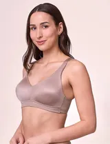 Bralette de microfibra color beige, con diseño de acabado invisible, pads removibles, tiras regulables y espalda en U. No posee aros.