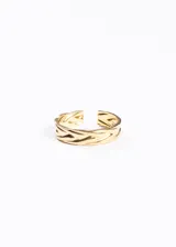 Anillo dorado ajustable de acero quirúrgico con diseño labrado.