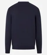 Suéter de punto color borgoña, con cuello redondo, sisas ligeramente desplazadas y bajo y puños acanalados.