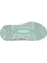 Championes Under Armour modelo Phantom X, de diseño futurista en color blanco con detalles en verde agua. Presentan una parte superior de tejido transpirable, estructura de TPU en el mediopié para soporte y entresuela con amortiguación de espuma reactiva.