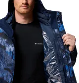 Campera 3 en 1 Columbia Whirlibird V Printed Omni-Tech para hombre, diseñada con tecnología impermeable y transpirable, y un patrón estampado en tonos de azul.