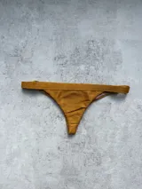 Bombacha colaless color dorado.