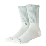 Medias de caña media Stance, color blanco con detalles en verde menta en la parte superior acanalada y en la puntera. Presentan el logo de la marca bordado en el lateral.