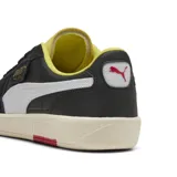 Championes Puma Ferrari Palermo, color negro con detalles en blanco y amarillo.