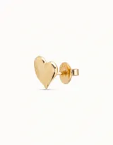 Piercing tipo stud con forma de corazón, fabricado en aleación de metales y bañado en plata.