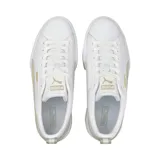 Championes Puma Mayze Lth blancos con detalles en beige y suela con plataforma.