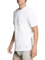 Pack de tres camisetas blancas de algodón orgánico, con cuello redondo, manga corta y logo bordado en el ruedo.