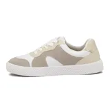 Champion deportivo de mujer, color blanco, con diseño de plataforma gruesa texturizada. Presenta recortes en el cuerpo y cordones negros.