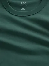 Remera de manga larga Gap, confeccionada en algodón de gramaje pesado, con cuello redondo y puños elásticos.