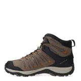 Botas de trekking Merrell Crosslander 3 Mid WP de media caña, confeccionadas en gamuza y malla transpirable en tonos marrón y negro, con cordones y suela de goma con gran tracción.