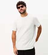 Remera deportiva Get Over de color azul marino, confeccionada en tech fleece con tecnología dry de secado rápido, cuello redondo y manga corta, de corte holgado.