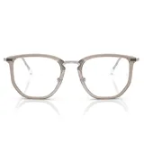 Lentes de receta Ray-Ban con marco de acetato transparente en tono grisáceo y puente metálico plateado.