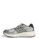 Championes Adidas Technochaos 2000 W color plateado y blanco, con detalles en negro y suela amortiguada.