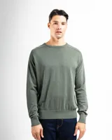 Buzo de tejido de punto 100% algodón, con cuello redondo, corte clásico y detalle de costura en los hombros. Presenta puños y ruedo acanalados.