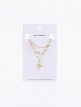 Collar dorado de tres cadenas con cuentas de colores y dije de serpiente.