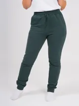 Pantalón de jogging gris melange, corte babucha, con cintura elástica ajustable con cordón y puños en los tobillos. Confeccionado en tejido de punto sin felpa.