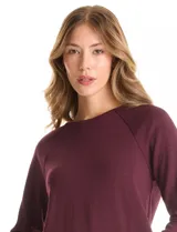 Conjunto de dos piezas compuesto por un buzo de cuello redondo con mangas raglán y un pantalón de pierna ancha con cintura elástica. Confeccionado en tejido de tacto suave con puños acanalados.