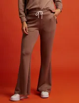 Pantalón de jogging negro de pierna ancha, con pretina ancha elastizada, lazo de ajuste y bolsillos delanteros.