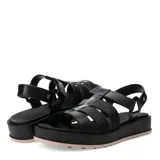 Sandalias de plataforma tipo jaula con tiras anchas de material sintético en color blanco hueso, cierre de velcro en el tobillo y suela de goma negra con base color caramelo.