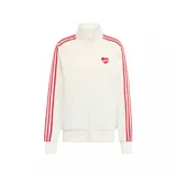 Campera deportiva Adidas Firebird Loose de color blanco hueso con rayas rojas en las mangas y cuello alto. Cuenta con cierre frontal y un parche bordado en forma de corazón rojo con tres líneas blancas en el pecho.
