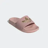 Sandalias Adidas Adilette Lite color rosa con logo dorado.