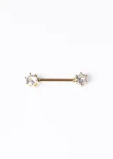 Piercing para pezón con barra recta de acero quirúrgico dorado y zirconias blancas en los extremos. Largo de la barra: 14mm. Grosor de la barra: 1.4mm. Diámetro de la zirconia: 5mm.