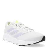 Championes deportivos Adidas modelo Switch Move, color blanco con las icónicas tres tiras en tono lila suave y detalles en amarillo neón en la lengüeta. Presentan una suela de espuma blanca con base negra y un diseño de malla transpirable.