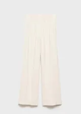 Pantalon wideleg de tiro alto, confeccionado en tejido fluido, con cintura elástica y diseño sin cierre.