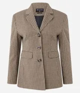 Blazer de sastrería con estampado pied de poule, corte estructurado, cuello con solapa clásica, cierre frontal de tres botones y bolsillos con solapa.
