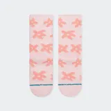 Medias de caña alta color rosa claro con estampado de flores rosas.