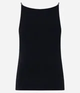 Blusa femenina sin mangas, confeccionada en tejido de algodón con elastano. Presenta un diseño ajustado al cuerpo con escote halter y tirantes finos elásticos.