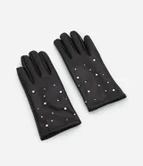 Guantes de cuero sintético color negro, con diseño de tachuelas metálicas doradas distribuidas en el dorso. Cuentan con forro interior para mayor calidez.