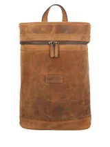 Mochila matera de cuero 100% natural color tostado, de diseño convertible con sistema ajustable para usar como mochila o bolso de hombro. Cuenta con compartimento principal con cierre, asa superior y detalles de la marca grabados en bajorrelieve.