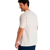 Remera de manga corta color crema con estampado de tractor en el pecho.